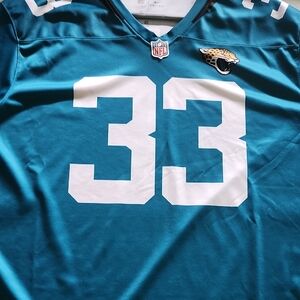 NFL Jacksonville Jaguars Teal Football Jersey #33 DEVIN LLOYD with White Numbers